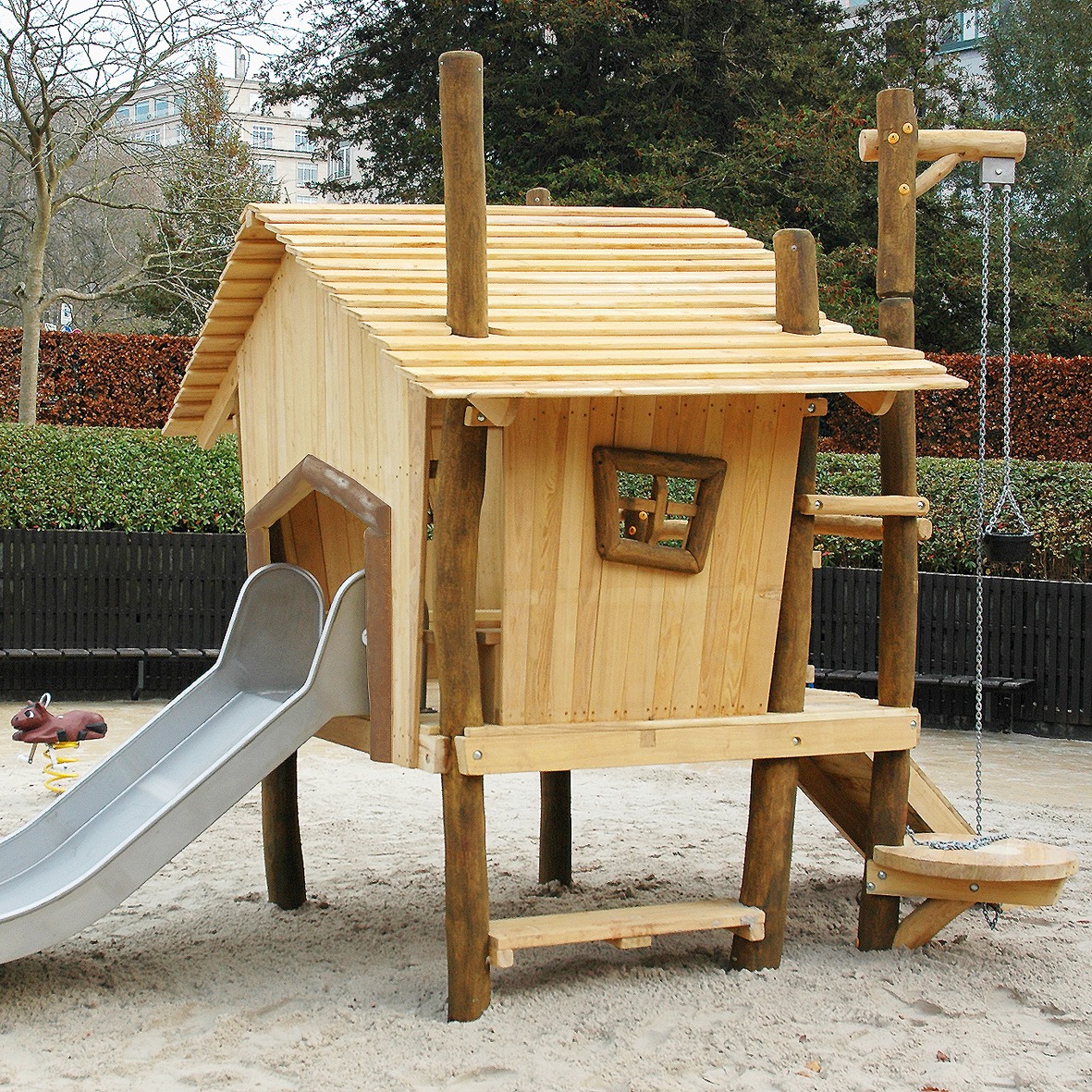 PLAYHOUSE ON STILTS WITH SAND PLAY AND SLIDE